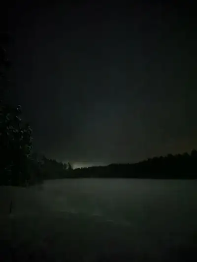 A frozen lake by the trail: never ski out onto the ice